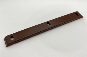 Wkładka plastikowa do zaczepu zamka brązowa
